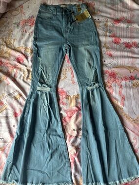 Light Blue Distressed Flared Jeans